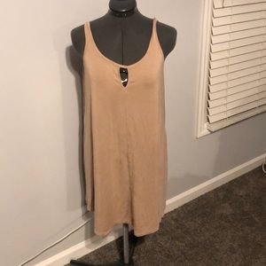 Cream cut out sleeveless tunic